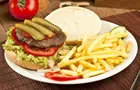 Answer STEAK, PICKLES, FRENCH FRIES, TOMATO, BREAD, SALAD, PLATE, ONION