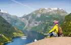 Answer MOUNTAIN, FJORD, BOAT, BACKPACK, HAT, SNOW, ROAD, ROCK